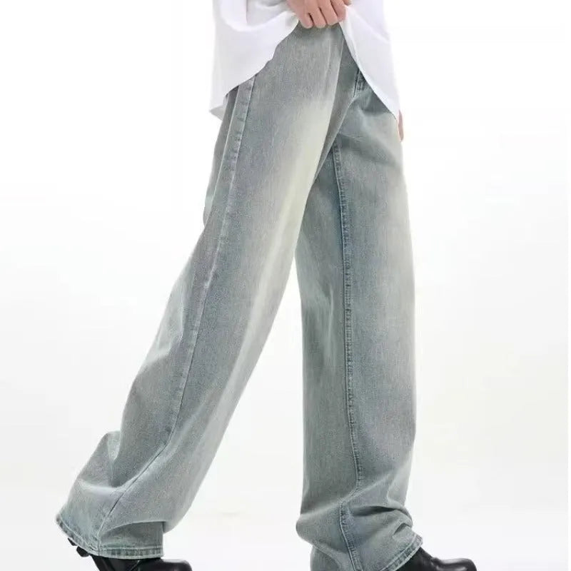 Blue loose-fit retro casual trousers with an elasticated waistband on a neutral background.