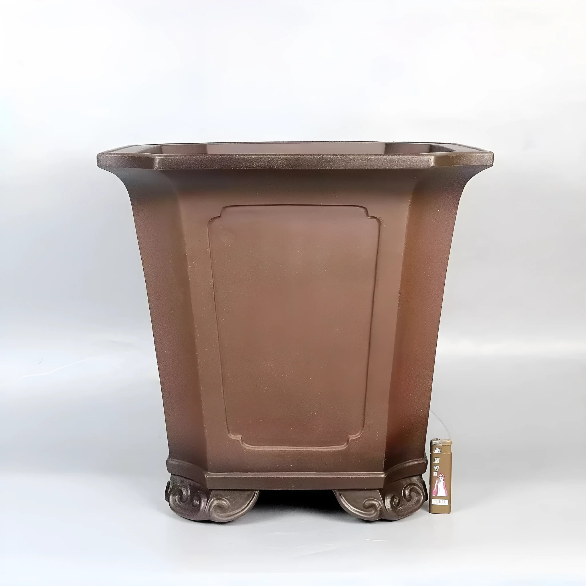 Ceramic antique redware flowerpot purple sand finish 40x40x40cm on a wooden table