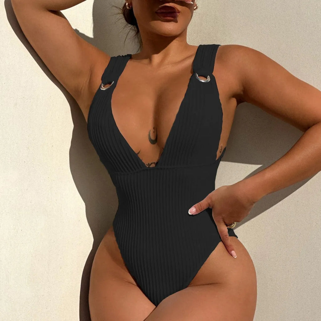 Solid colour one-piece swimsuit for women in black, displayed on a mannequin.
