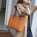 Women's genuine leather commuter shoulder bag with multiple internal compartments in horizontal square shape