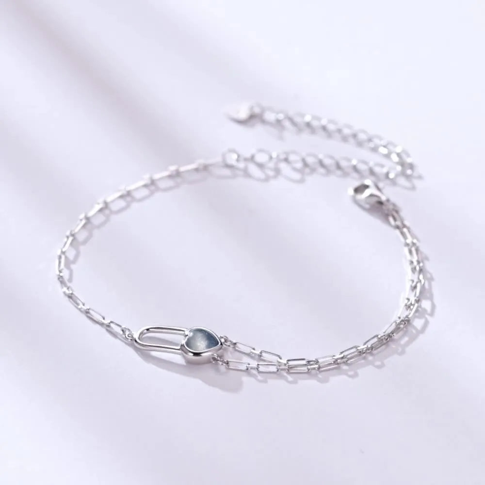 S925 sterling silver heart lock bracelet for women with electroplated finish on white background