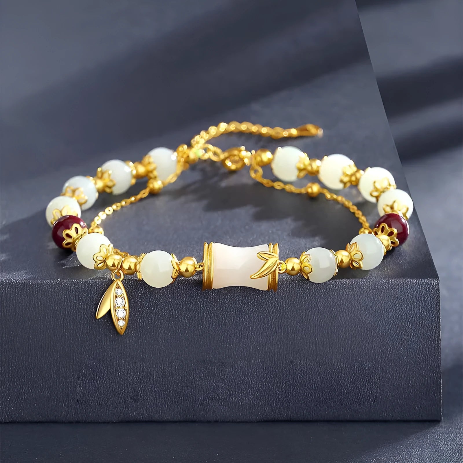 Retro bamboo pattern bracelet with floral glass beads in electroplated finish