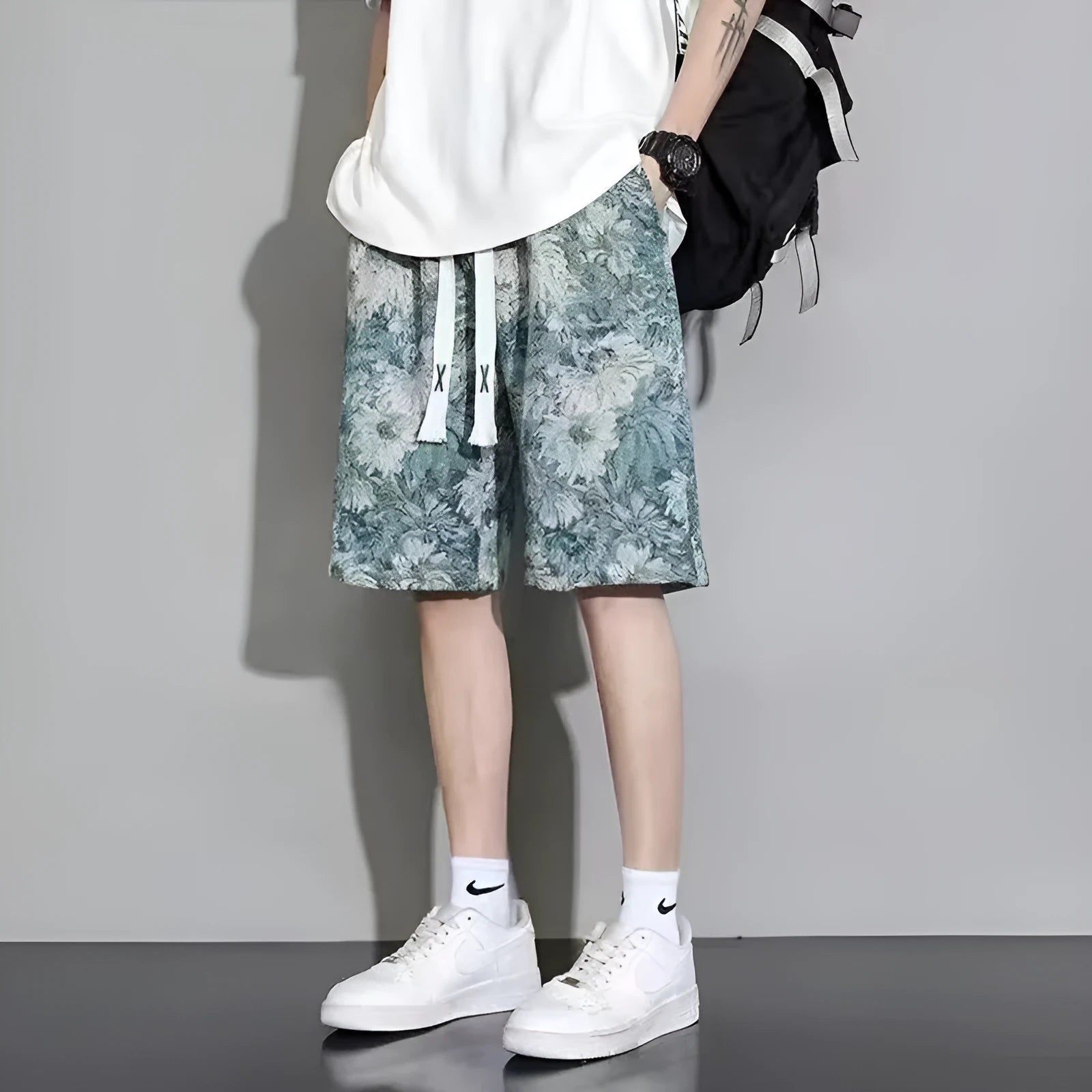 Men's polyester summer shorts in fifth pants length showing bear pattern colour option