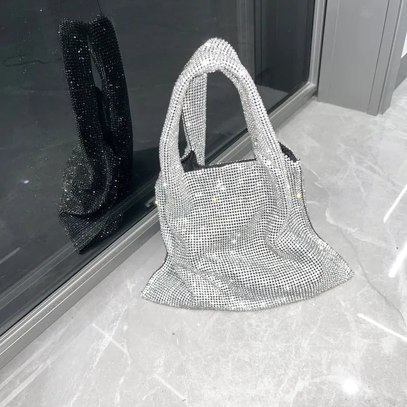 Silver cotton thread party handbag with rhinestone detailing and open outer pocket