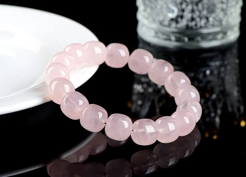Pink crystal barrel bead bracelet with natural bamboo elements, geometric 11-12mm beads
