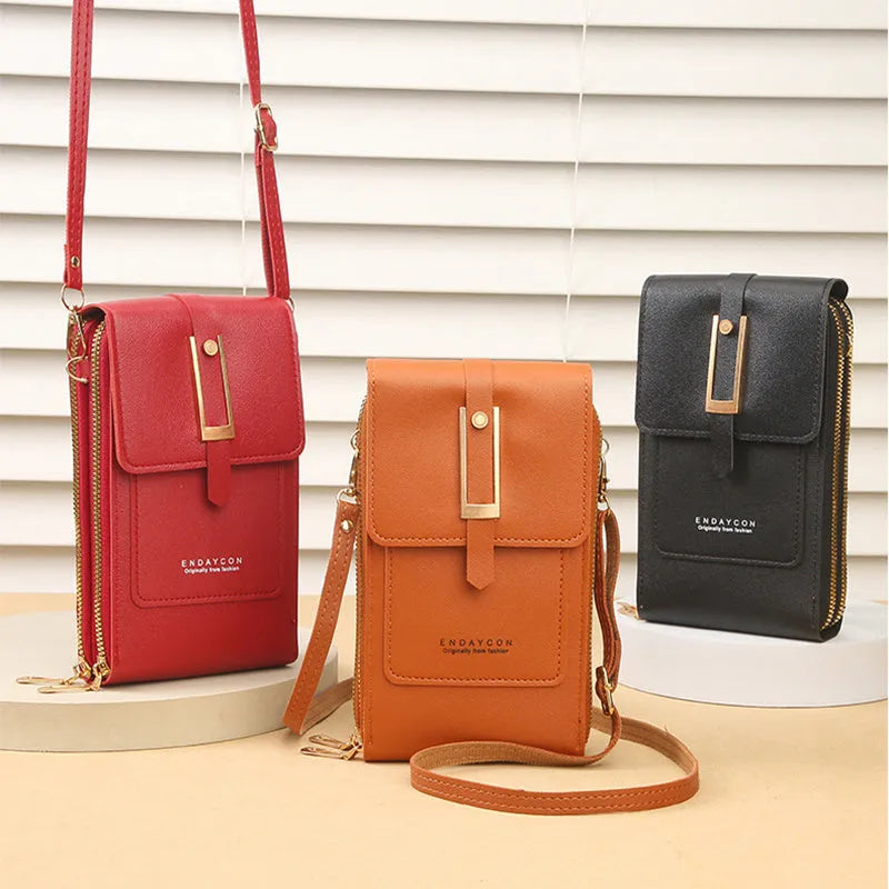 Women's transparent crossbody shoulder bag in PU material with touch screen phone capability, available in multiple colours