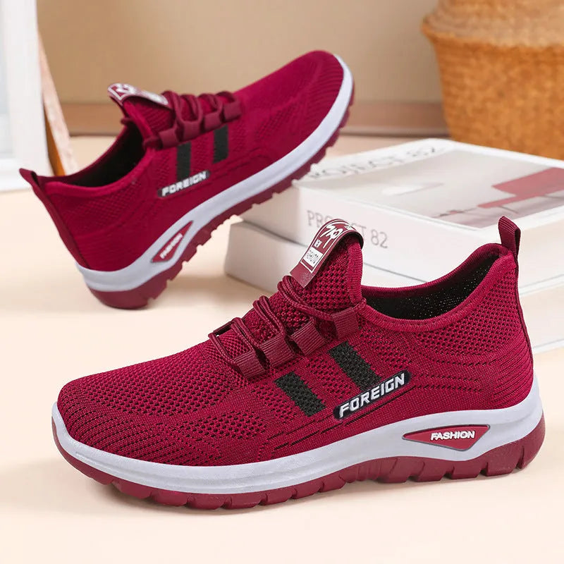 Breathable mesh casual shoes in black, grey, purple, and red colours with flat PVC sole
