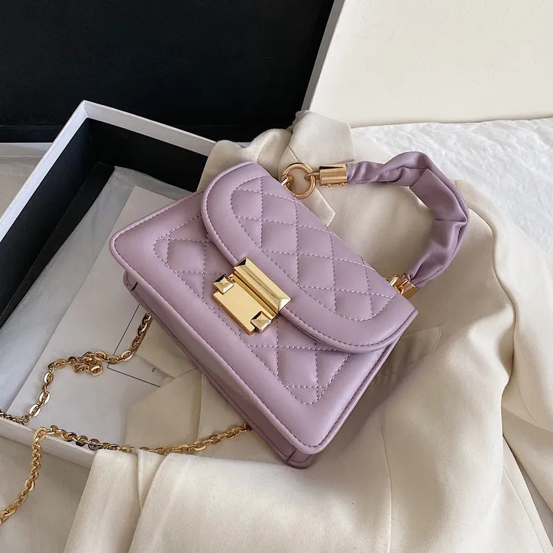Korean style women's messenger bag with rhombus pattern on soft PU surface in purple colour
