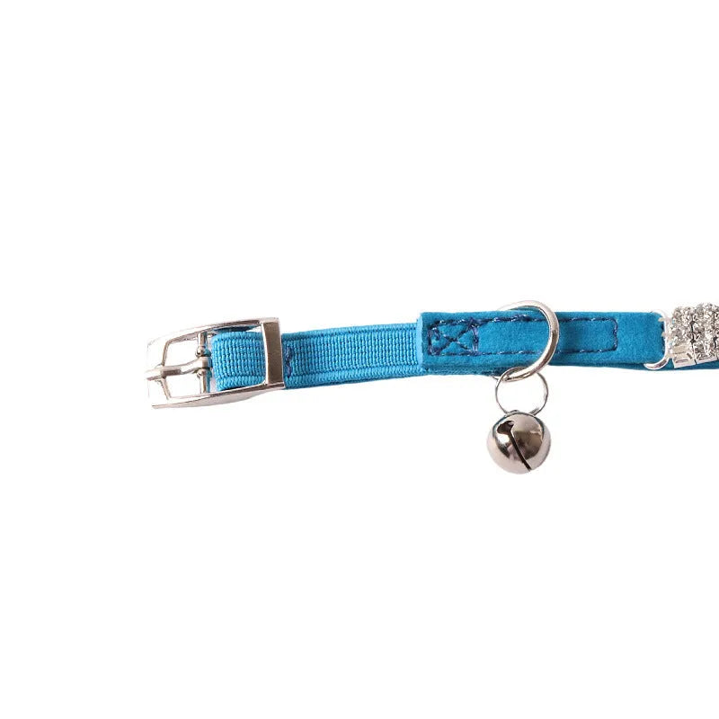 Flannel cat collar with elastic buckle and textured gang drill design in multiple colours.