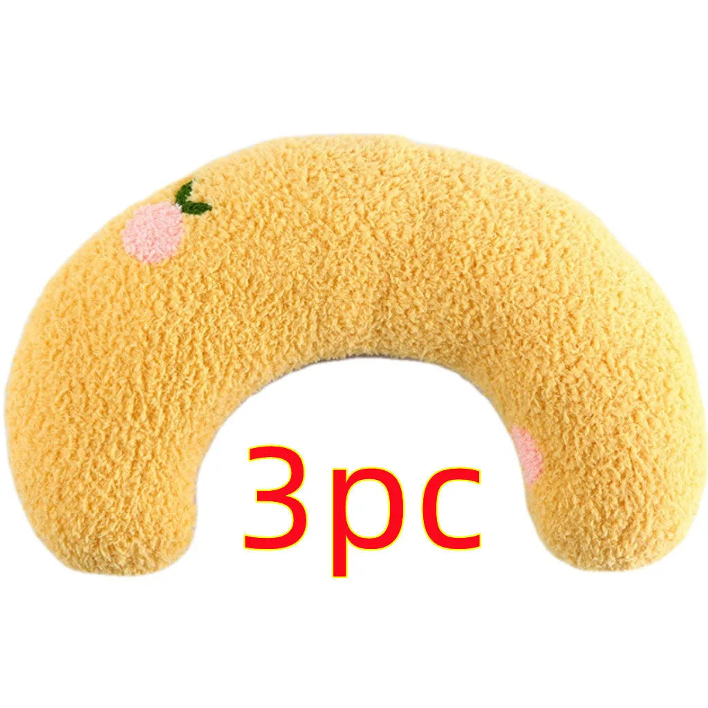 Small white half-donut plush pet pillow for cats and small dogs, 27x17x6cm, with quilted faux fur.
