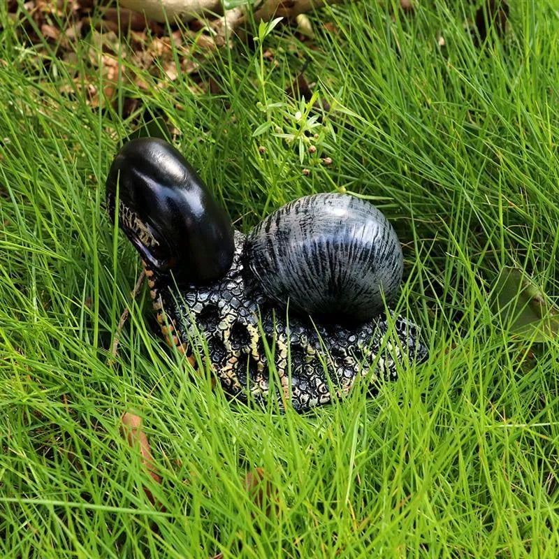 Modern simple resin sculpture of a snail character for garden or home decoration