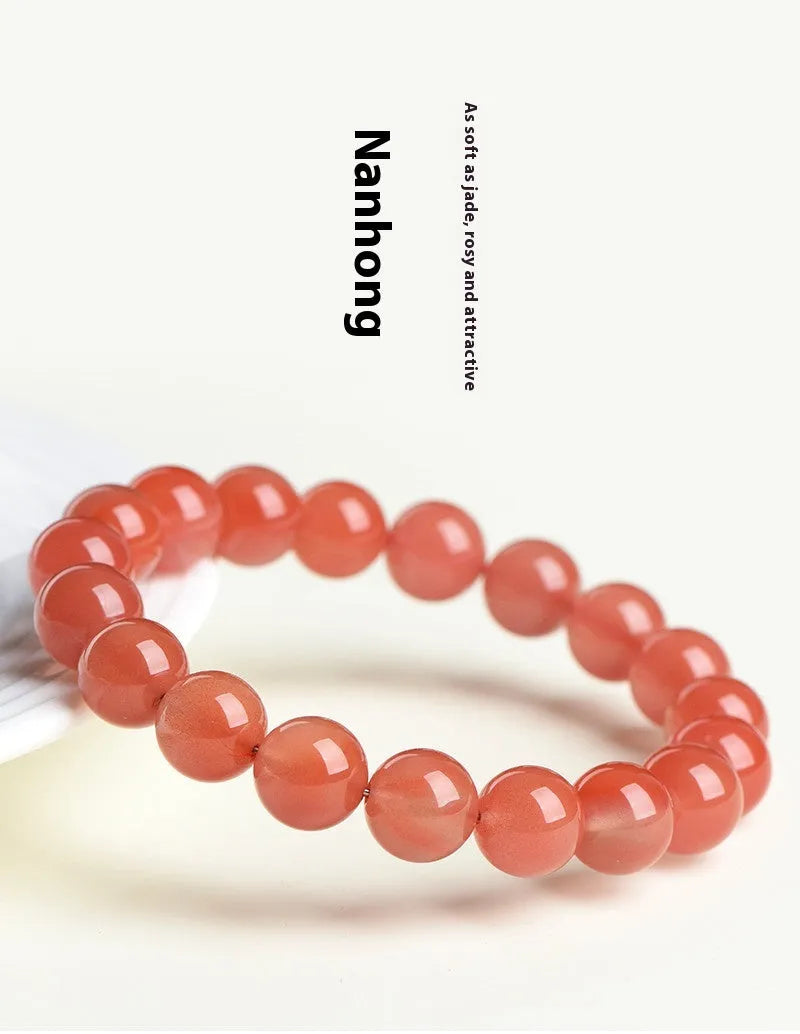 Natural cherry red agate bracelet with polished scattered beads, shown in a single circle style.