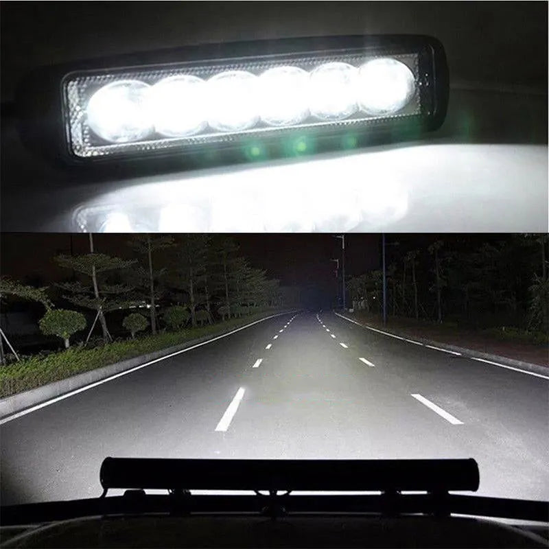 Black die-cast aluminium auxiliary driving light with a polycarbonate lens.