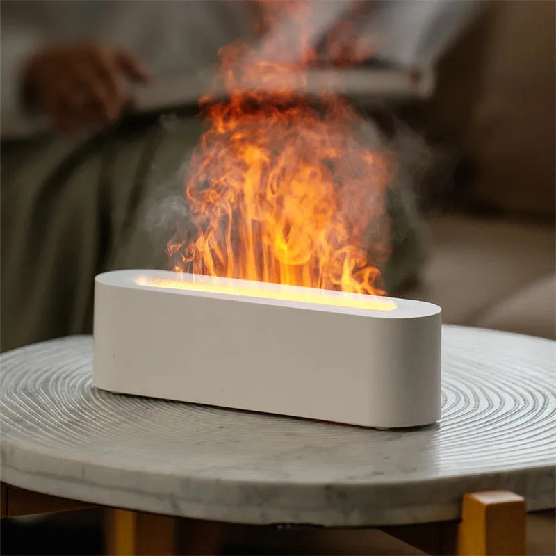 White square DQ709 ultrasonic aroma diffuser with LED flame light effect and cool mist vapour.