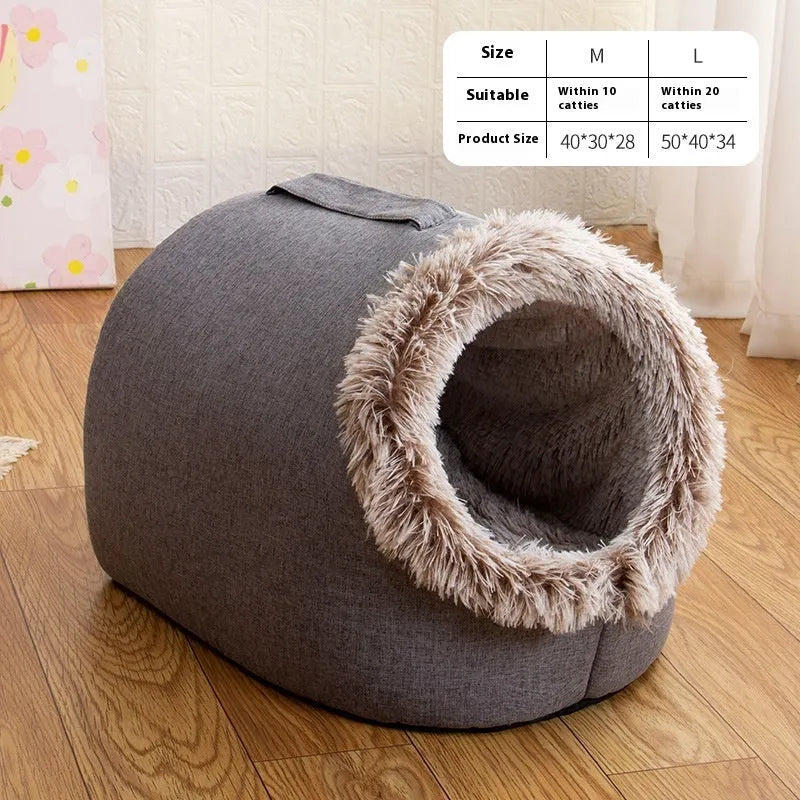 Grey fleece-lined closed cat sleeping bag with portable handle on brown floor