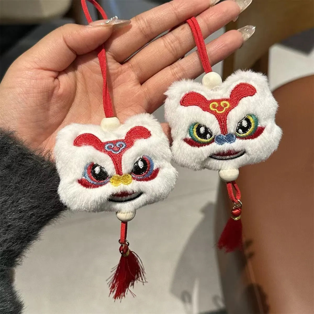 Chinese style plush lion keychain ornament with star stone detail in blue colour