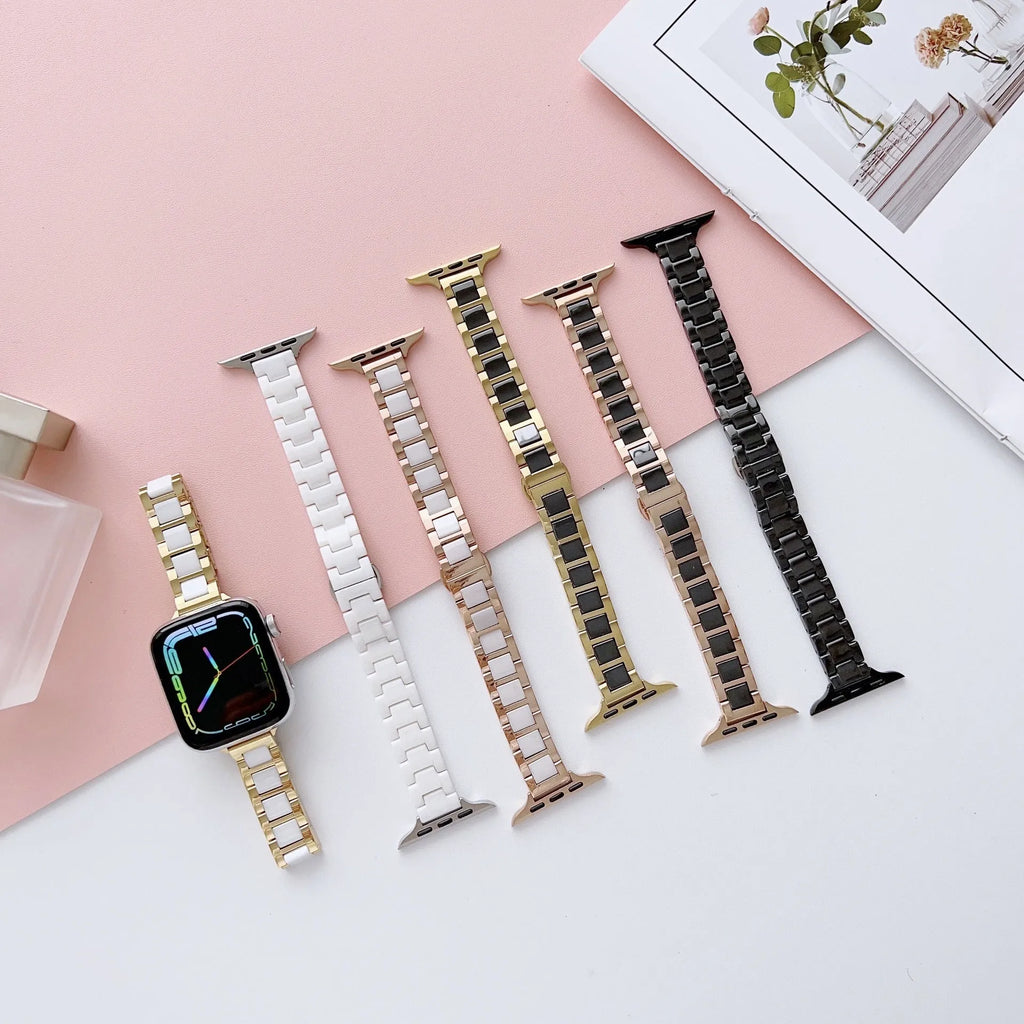 Stainless steel ceramic watch band for Apple Watch 38-49mm in gold with black ceramic finish on a wrist