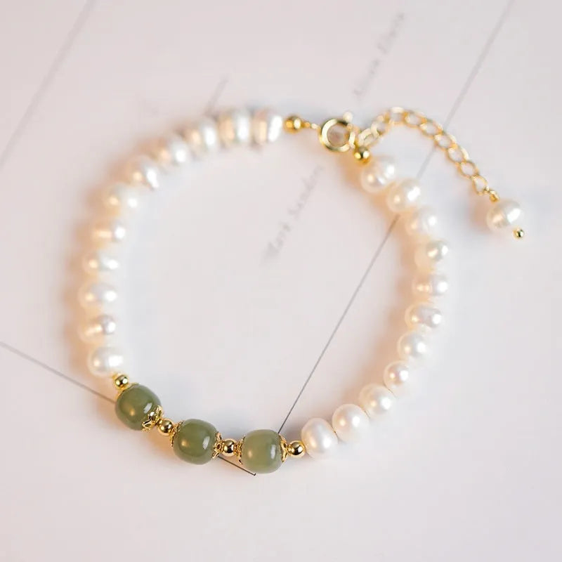 Korean style freshwater pearl bracelet with diamond shapes in deep or light Hetian jade colour.