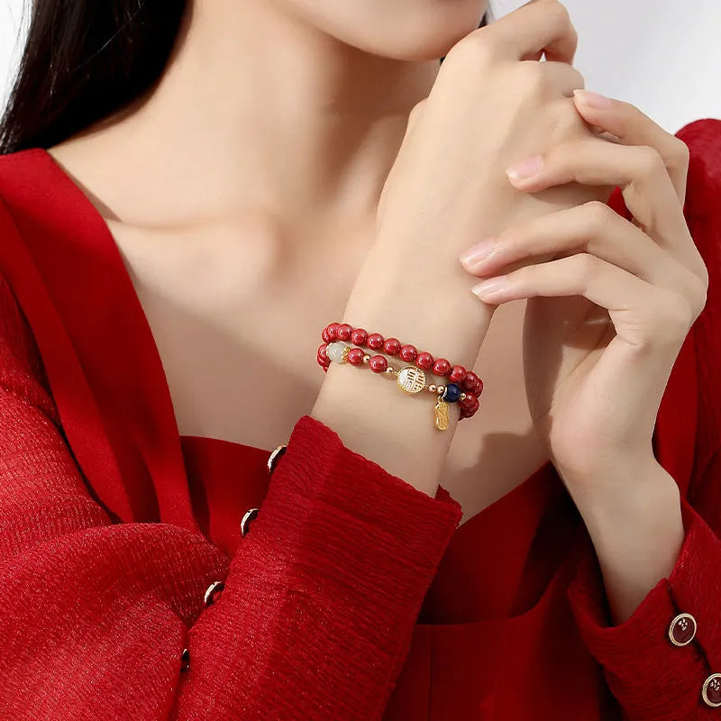 S925 sterling silver bracelet with 6mm beads, white shell, cinnabar, and a purple gold sandstone blessing card charm.