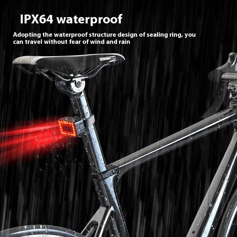 Smart millimetre wave radar bicycle taillight with mounting bracket on a black background.