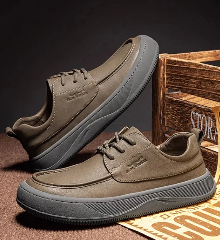 Men's brown retro-style leather casual shoes with a big toe design and visible stitching.