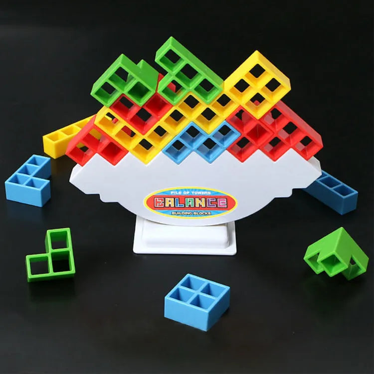 16-piece plastic balance stacking blocks with chassis and base on a table
