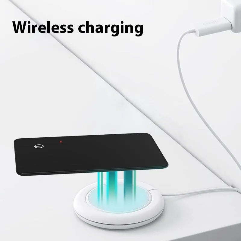 Black card-shaped pet tracker with wireless charging and NFC, showing hanging hole.