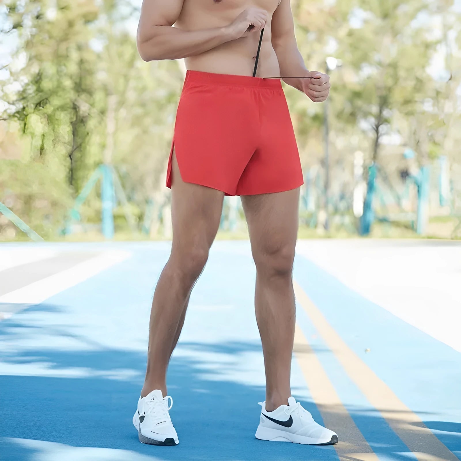 Men's black high-waist off-road running shorts with a loose, breathable fit.