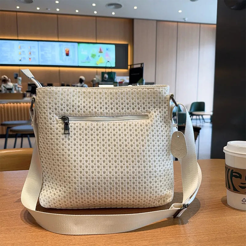 Mesh crossbody bag large capacity white net horizontal square shape with slit pocket and single shoulder strap
