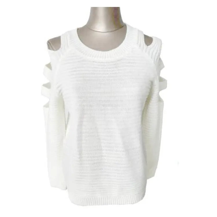 White women's hollow-out knitted long sleeve shirt with round neck on a hanger.