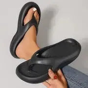 Women's thick-soled EVA flip-flops in black, white, or grey colours with non-slip and anti-odour properties