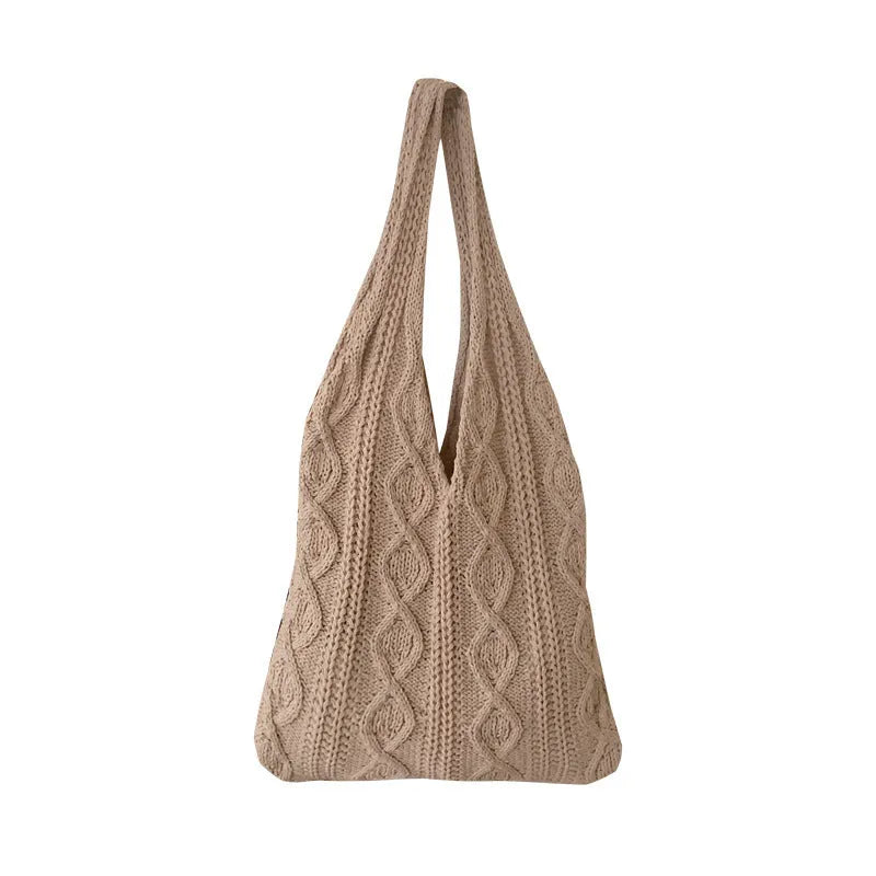 Retro hollow knitted wool yarn women's shoulder tote bag in a solid colour with double straps.