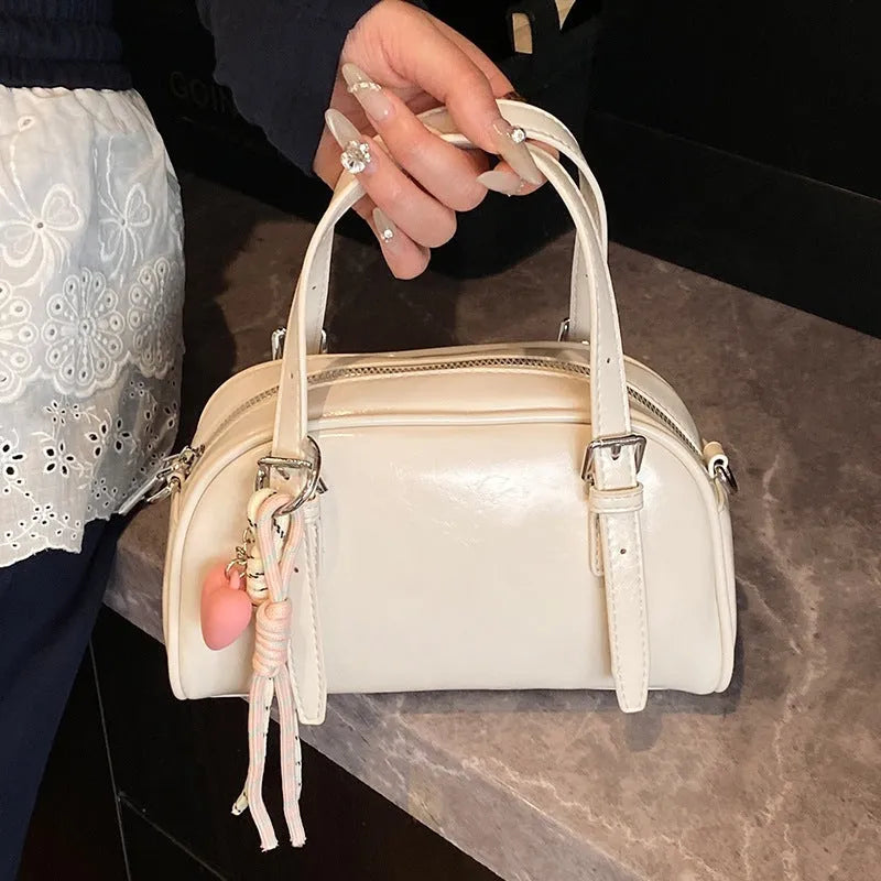 Korean-style square shell shoulder bag in soft PU leather with optional pendant decoration