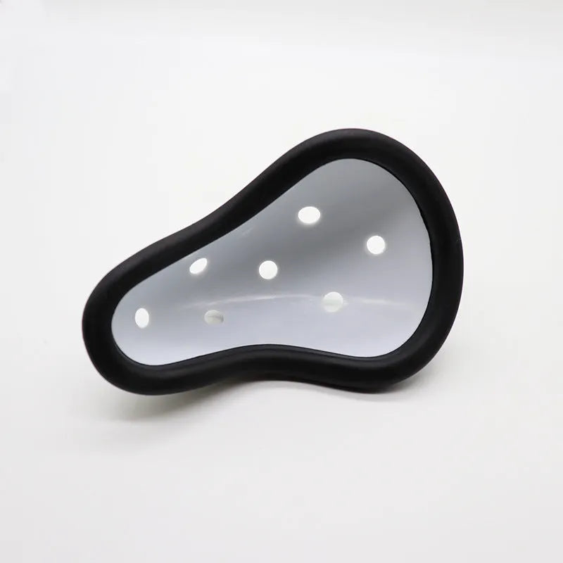 Rubber sports genital protector groin guard for adult and child sizes, used in boxing rugby hockey and martial arts.