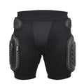 Black cycling hip protection pants showing protective panel positioning for hip impact reduction