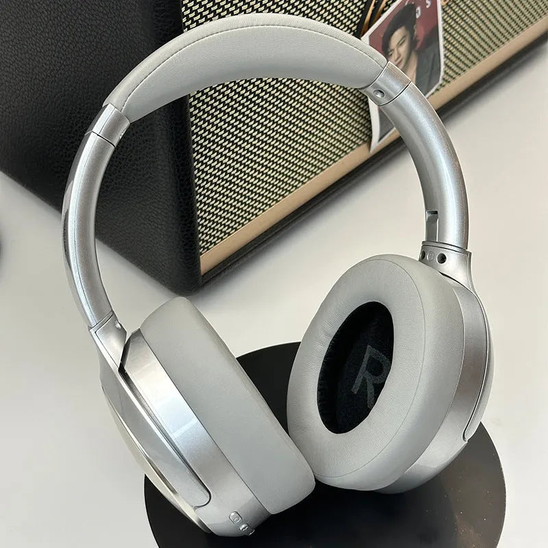 Retro-style brown wireless Bluetooth headset with metal details and sport headband design.