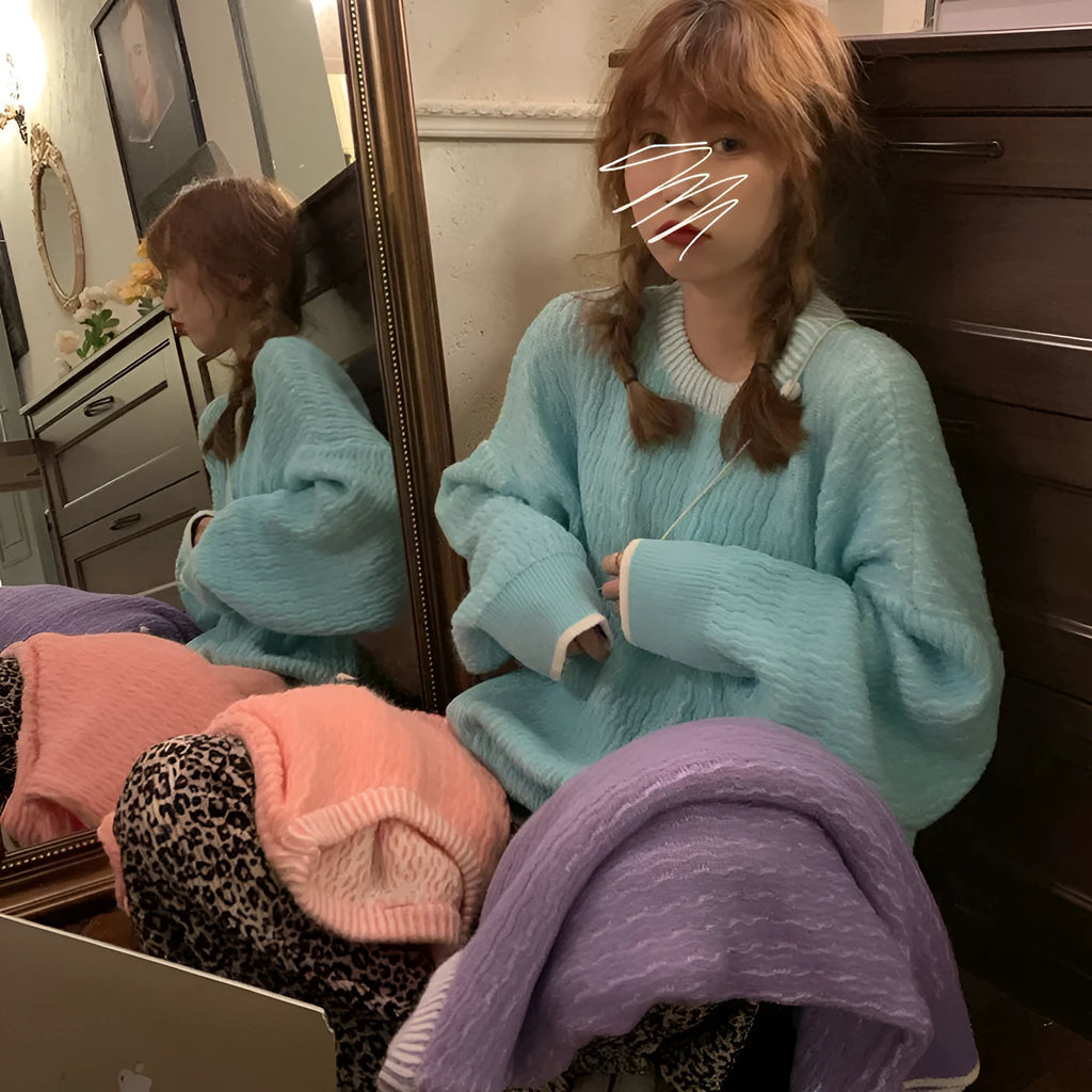 Women's loose fit pullover sweater in solid blue colour with regular sleeves