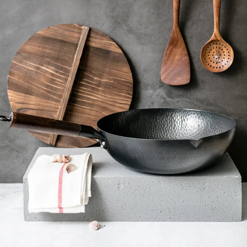 Traditional black iron wok with wooden handle, 40cm diameter base