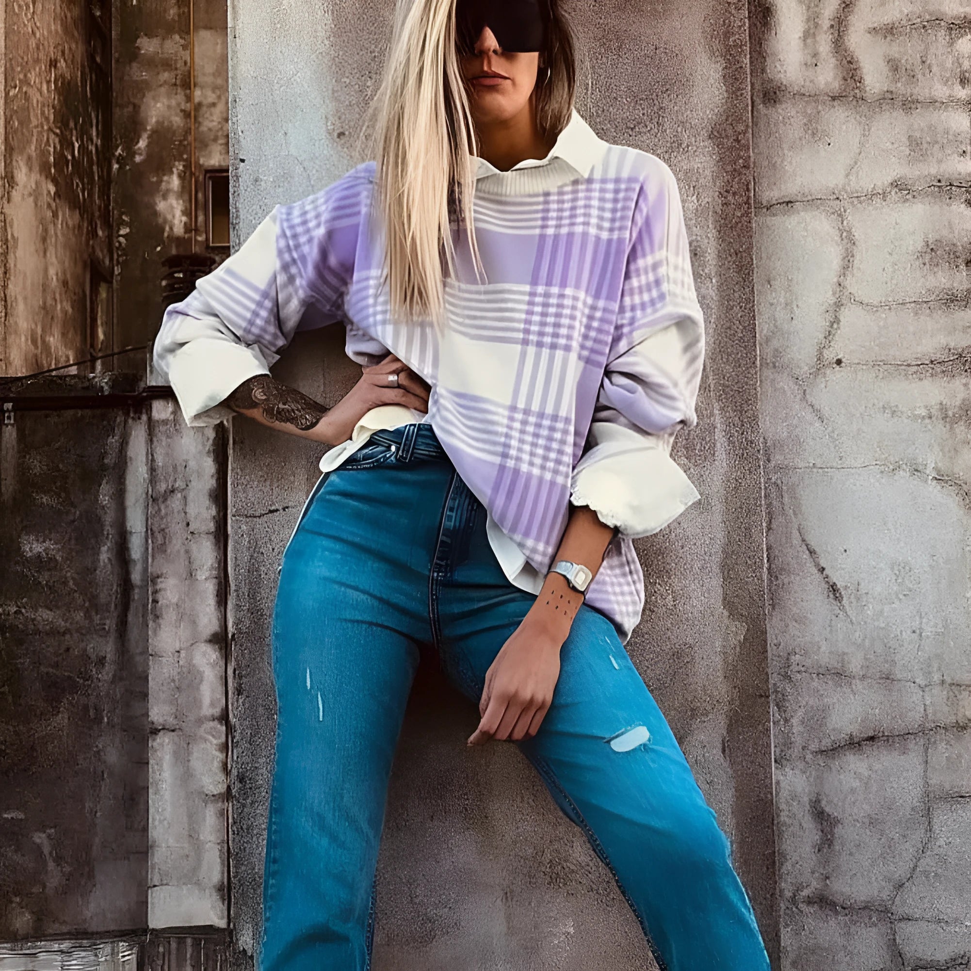 Lilac plaid print women's loose-fit long sleeve sweater with ribbed cuff and hem trim.
