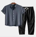 Men's slim fit floral print casual suit with cardigan-style shirt and trousers.