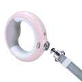 Luminous automatic telescopic dog rope in pink with USB rechargeable lithium battery and ABS housing