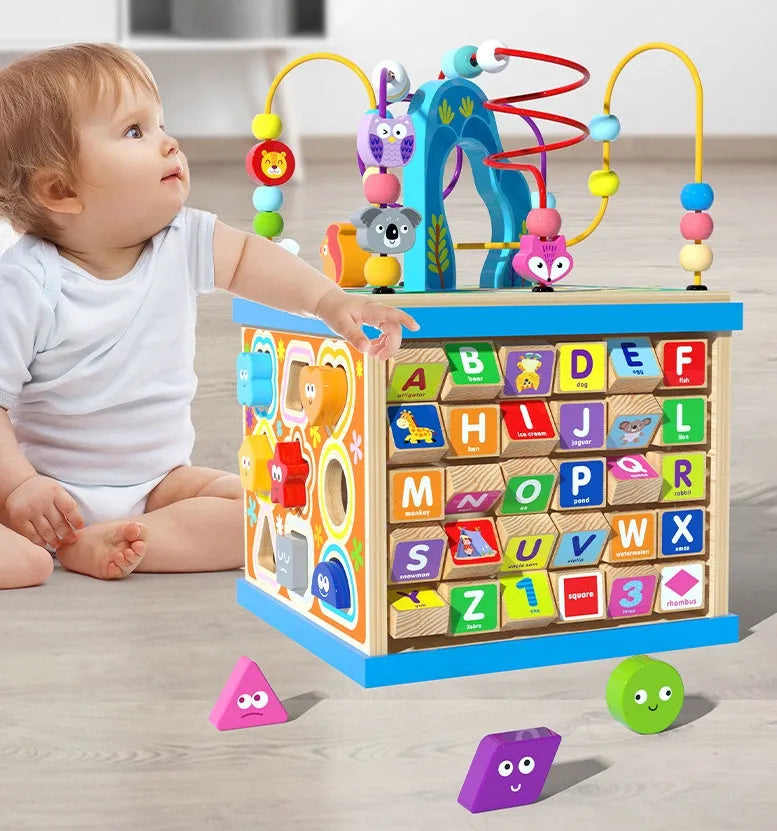 Large blue wooden bead maze treasure box toy for toddlers on a white background