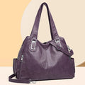 Soft PU women's tote bag in square vertical model with single shoulder strap showing internal organisational pockets