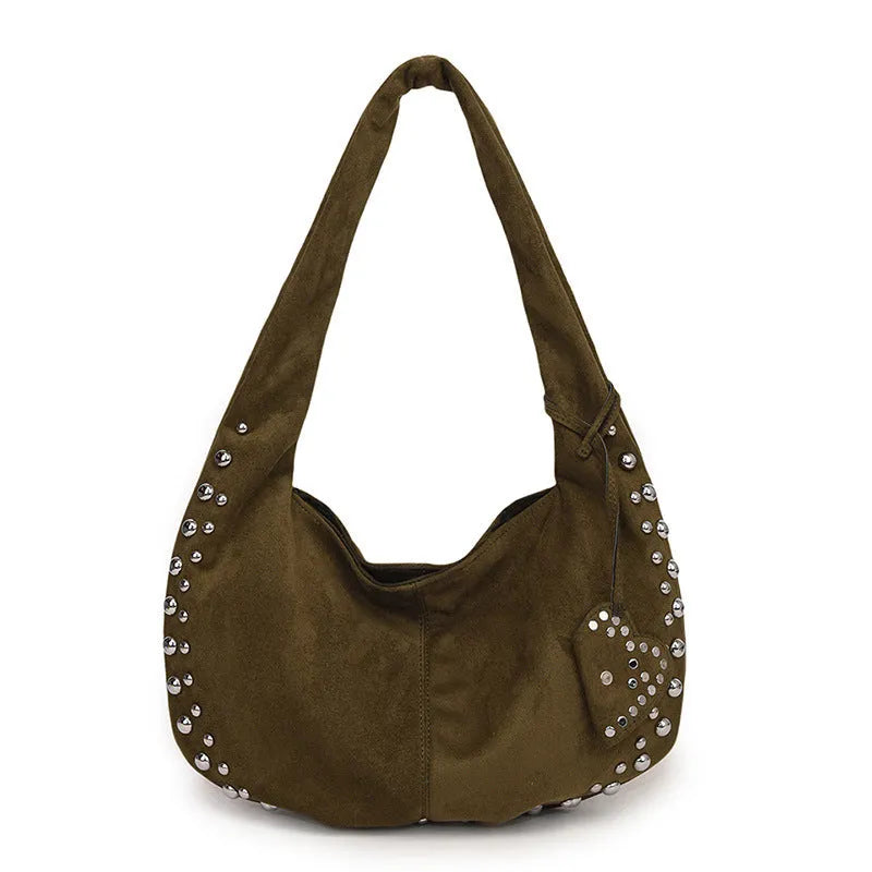Soft plush retro tote handbag shown in black colour with strapless underarm carry design