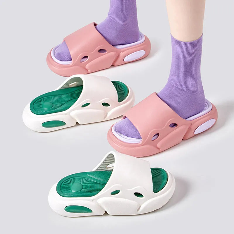 Two-colour EVA slippers showing black and white design with thick sole and leather lining