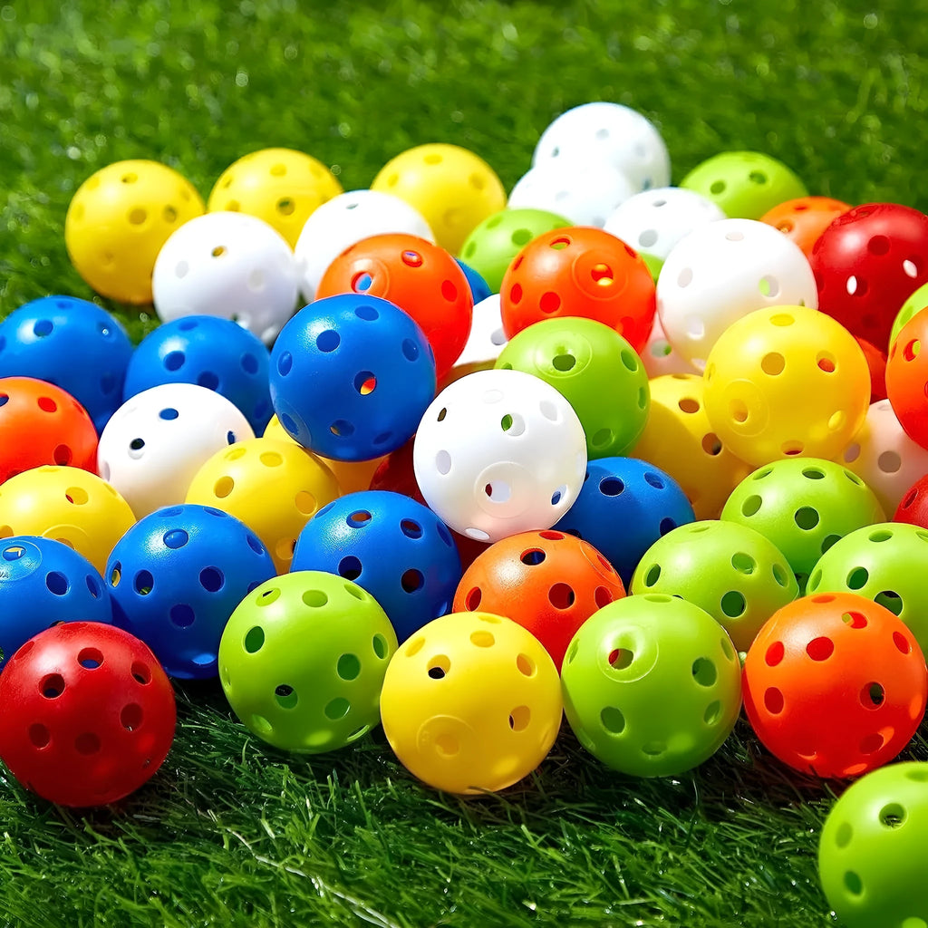 Multi-colour golf practice balls in red, orange, blue, green, white, and yellow, shown in a net pocket.