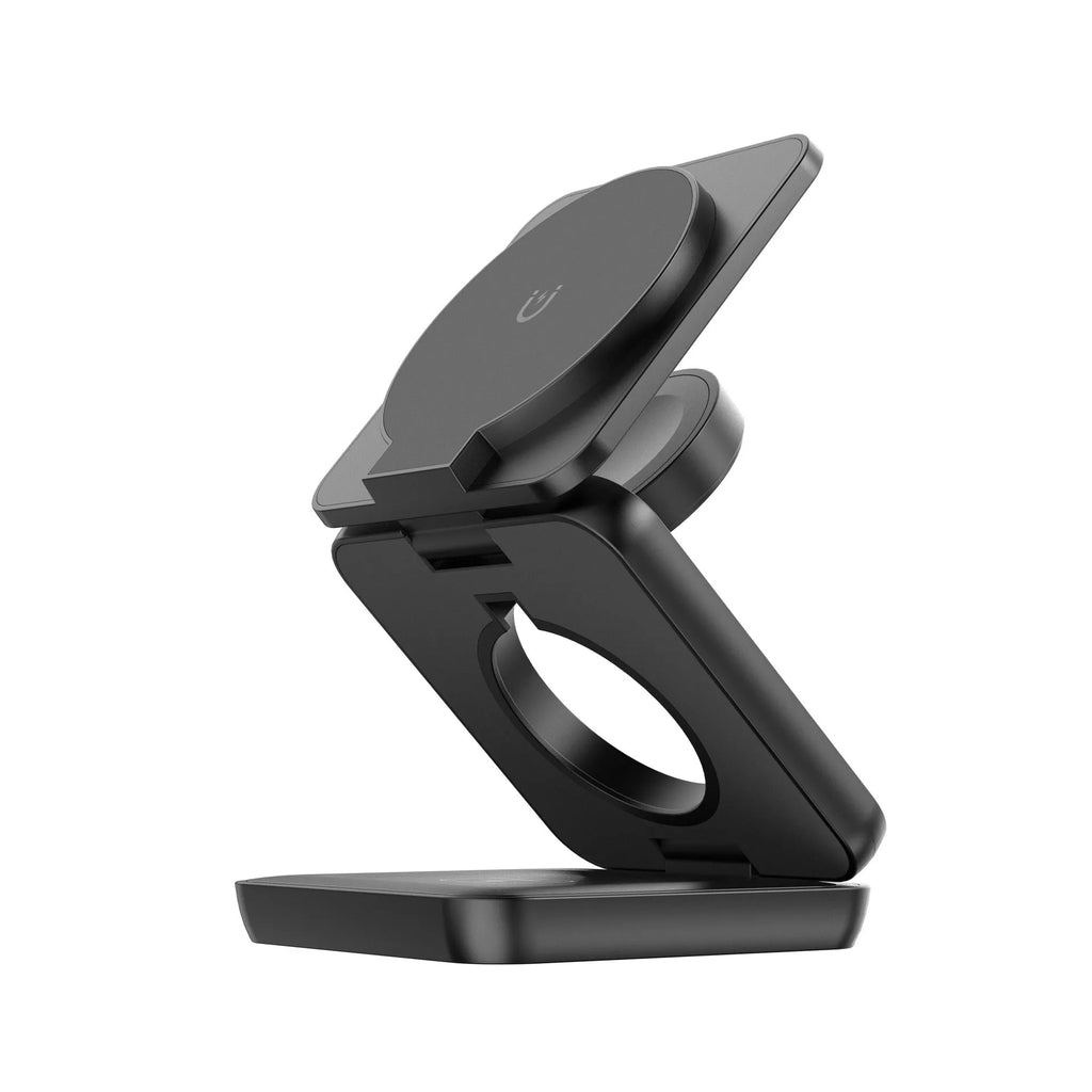 White foldable magnetic wireless charger and phone holder on a desk