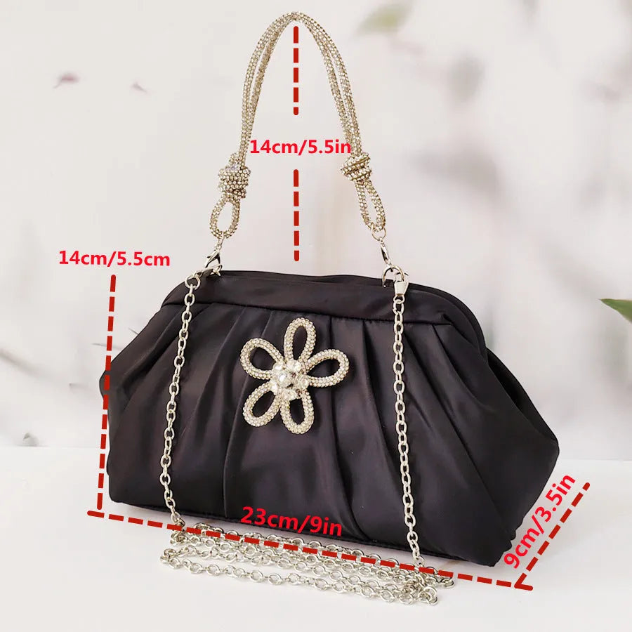 Women's soft polyester dinner messenger bag in lavender purple showing fold, diamond, and chain details.