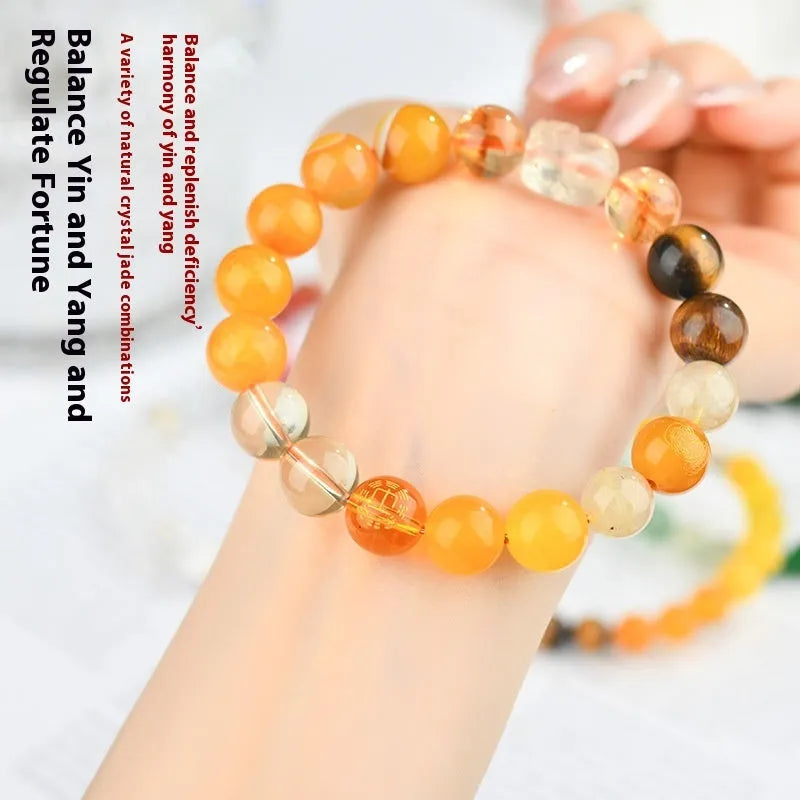 Handmade five elements natural crystal bracelet in geometric shape on a wrist.