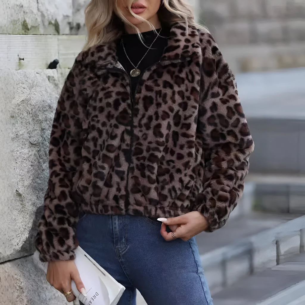 Women's loose-fitting leopard print plush coat with a front zipper and long sleeves.
